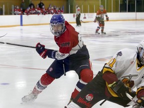 Rayside-Balfour Canadians forward Owen Perala (67) forechecks against the Timmins Rock during NOJHL action at Chelmsford Arena in Chelmsford, Ontario on Thursday, November 19, 2020.