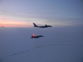 Canadian and American jets intercept two Russian Tu-142 maritime reconnaissance aircraft entering the Alaskan Air Defense Identification Zone on Mar. 9th. Photo By North American Aerospace Defence Command