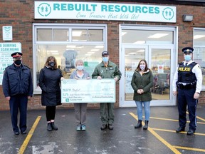 Maureen Brazeau of Rebuilt Resources makes an $8,500 donation to Project Lifesaver, represented here by officials from North Bay Police, Ontario Provincial Police, One Kids Place and the Alzheimer Society.
Supplied Photo