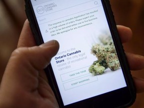 An Ontario Cannabis Store website pictured on a mobile phone Ottawa on Thursday, Oct. 18, 2018.