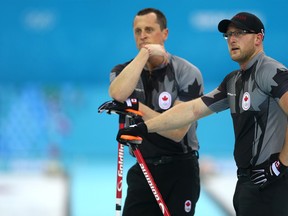 Canadian Press

Team Canada's E.J. Harnden (left) and Ryan Harnden take a breather during the 2014 Winter Olympics in Sochi, Russia