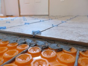 DITRA-HEAT infloor heating cables embedded directly under ceramic tiles provide very targeted heat that you can feel with your feet. Steve Maxwell