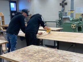 Students from ESCHS were in the wood shop cutting forms for the Community Christmas display.