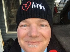 Mayor Peter Brown shows off his community pride with a Heart Airdrie toque. Submitted