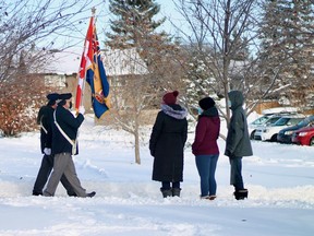 Members of the Airdrie Legion march by on Remembrance Day 2020. Photo by Kelsey Yates