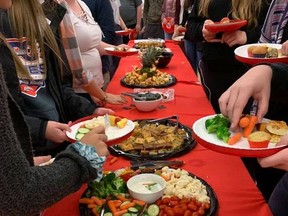 Students at North Hastings High School in Bancroft receive food provided by the Hastings and Prince Edward Learning Foundation. A decrease in donations and an increase in costs is putting some foundation services at risk.