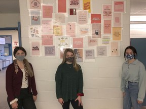 Pictured are (from left) are St. Theresa Catholic Secondary School students Paige Chatten, Emma Widdows and Maya Anderson with some of the positive reinforcement notes they've posted throughout the school to help students who may be suffering with mental health issues. BRUCE BELL