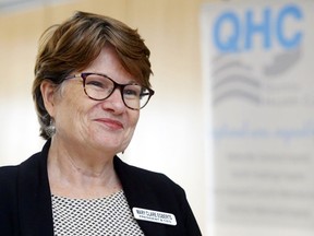 Quinte Health Care administrator Mary Clare Egberts smiles June 10 at Belleville General Hospital after the announcement of new provincail funding for the corporation. Tuesday marked her final scheduled board meeting before her December retirement.