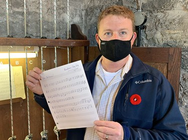 Will Fletcher, carillonneur at Grace Anglican Church shows the sheet music he transcribed to play Rule Britannia on the church bells just after 11 a.m. on Wednesday November 11, 2020 in Brantford, Ontario. Brian Thompson/Brantford Expositor/Postmedia Network