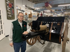 Bob Ion, vice-chair of the Canadian Military Heritage Museum, with a 1906 British-made gun, which has been refurbished and was given to the museum prior to the pandemic shutdown. The gun is one of the newest additions to the museum's collection.