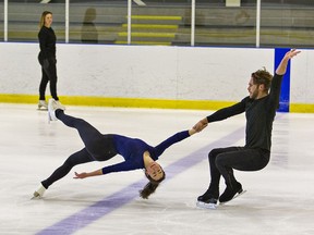 Coach Alison Purkiss watches as pairs skaters Evelyn Walsh and Trennt Michaud practise at the Wayne Gretzky Sports Centre in Brantford, Ontario. The pair placed second at nationals last year.