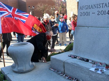Residents laid their poppies at the cenotaph in downtown Chatham following a Remembrance Day service on Wednesday. Ellwood Shreve/Chatham Daily News/Postmedia