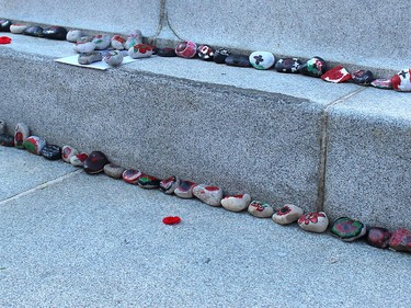Students at Winston Churchill Public School in Chatham painted these rocks in honour of Remembrance Day. They were placed on the cenotaph in downtown Chatham ahead of the Remembrance Day service held on Wednesday.Ellwood Shreve/Chatham Daily News/Postmedia