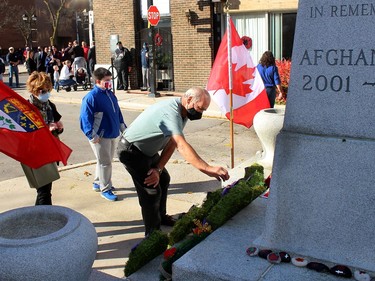 Residents laid their poppies at the cenotaph in downtown Chatham following a Remembrance Day service on Wednesday. Ellwood Shreve/Chatham Daily News/Postmedia