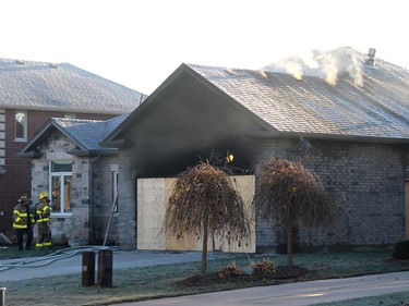 Firefighters were called back to the scene of a house fire on Valencia Drive in Chatham on Thursday that began to shoulder after the home caught fire on Wednesday. Ellwood Shreve/Chatham Daily News/Postmedia Network