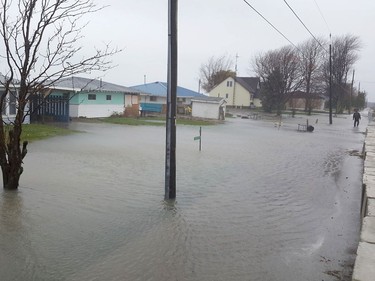 A flooded Erie Shore Drive is shown on Sunday morning. Trevor Terfloth/Chatham Daily News/Postmedia Network