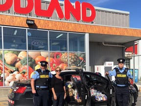 SD&G OPP Auxiliary officers and volunteers at the Ingleside location during a previous edition of the Stuff a Cruiser Food Drive. Handout/Cornwall Standard-Freeholder/Postmedia Network

Handout Not For Resale