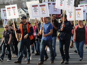 Some of the marchers on Pitt St. in Cornwall last Saturday afternoon. Photo on Saturday, Nov. 7, 2020, in Cornwall, Ont. Todd Hambleton/Cornwall Standard-Freeholder/Postmedia Network