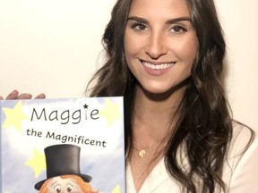 Teacher, author and artist Erin Lee, with her first children's book, Maggie the Magnificent. Handout/Cornwall Standard-Freeholder/Postmedia Network

Handout Not For Resale