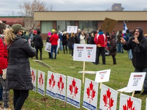 While demonstrators and mask-wearing observers exchanged words throughout the event, the protest against lockdown measures never escalated to anything more, on Saturday November 21, 2020 in Cornwall, Ont.
John Macgillis/Special to the Cornwall Standard-Freeholder/Postmedia Network