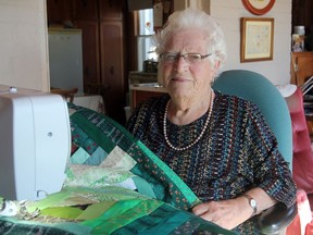 Phyllis Vanhorne, 98, in her sewing room in Kingston on Wednesday. (Steph Crosier/The Whig-Standard)