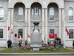 A small, by-invitation ceremony marked Remembrance Day in Napanee at the cenotaph in front of the Lennox and Addington County Court House on Wednesday. (Meghan Balogh/The Whig-Standard)