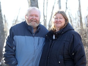 Jim and Sherry Beattie, seen outside their Erinsville home on Wednesday, are survivors of heart and stroke issues. The couple, and many others with underlying medical conditions, have found comfort in online survivor communities while they take extra precautions to stay home and away from possible exposure to COVID-19.