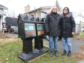 Melanie Leclair and her daughter Kiara Neill created a station outside their home in the Rideau Heights neighbourhood in Kingston where people can take food or other essential items if they have a need or donate items to share.