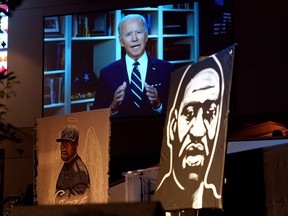 Then Democratic presidential candidate and former vice-president Joe Biden speaks via video link as family and guests attend the funeral service for George Floyd at The Fountain of Praise Church on June 9, 2020, in Houston.