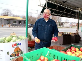 Joe Quattrocchi, owner of Quattrocchi's Specialty foods at 662 Montreal St. in Kingston, is concerned with petty crime and trespassing issues he said can be traced to users of the Integrated Care Hub across the street at 661 Montreal St. (Ian MacAlpine/The Whig-Standard)