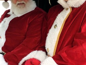 Santa and Holly Claus travelled the streets of Lansdowne visiting residents from a proper social distance on November 15. Photo by Donna Dempsey