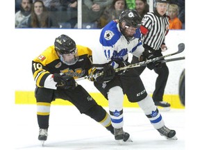 Justin Zuber of the Waterloo Siskins tangles with Cohen Kiteley of the London Nationals in London on Wednesday May 8, 2019. (Derek Ruttan/The London Free Press)