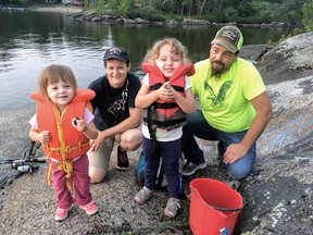 In a two-year-old photo, Jason Emond and Heather Thomas enjoy a fishing trip with his two children, Mia, then two years old, and Jemma, four years old at the time.
Submitted Photo