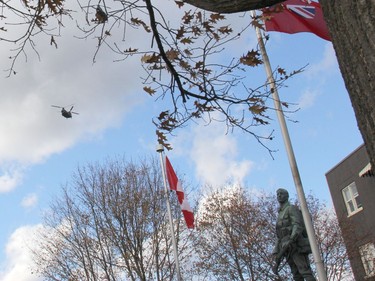 Four CH-147F Chinook helicopters from 450 Tactical Helicopter Squadron based at Garrison Petawawa did a flyover during Remembrance Day ceremonies in Pembroke. Anthony Dixon