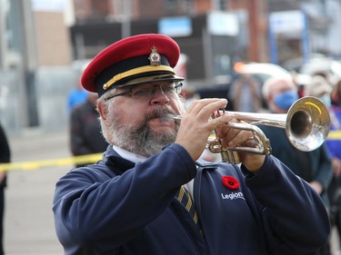 Pembroke Legion Band Director Gordon Tapp performs The Last Post during Remembrance Day ceremonies in Pembroke on Nov. 11. Anthony Dixon