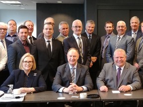 Jamie Lim, outgoing president and chief executive officer with the Ontario Forest Industries Association, is seen here, seated from left, with Ontario Natural Resources and Forestry Minister John Yakabuski and Ontario Premier Doug Ford during the OFIA’s board of directors meeting held in Toronto in June 2019. After holding the position for 17 years, Lim is retiring as OFIA's CEO.

Supplied