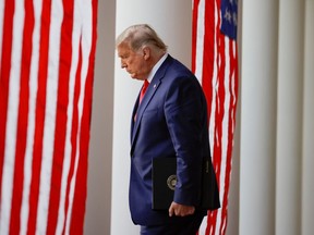 U.S. President Donald Trump walks down the West Wing colonnade from the Oval Office to the Rose Garden at the White House in Washington, D.C., on Nov. 13.