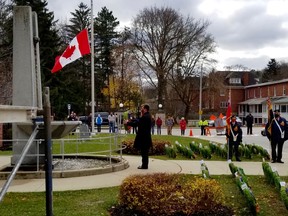 Spectators were sparse at this year's COVID-19-modified Remembrance Day service Wednesday, Nov. 11, 2020 in Owen Sound, Ont. Bruce-Grey-Owen Sound MPP Bill Walker laid the first wreath, on behalf of MP Alex Ruff. (Scott Dunn/The Sun Times/Postmedia Network)