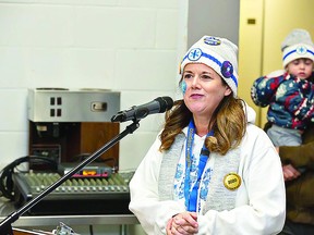 Jennifer Sarlo speaks during the 2020 Coldest Night of the Year, which took place before the March coronavirus shutdown. this year's fundraiser has a dual format.