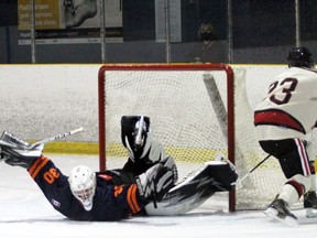 PETER RUICCI/Sault Star

Soo Thunderbirds goalie Alex Bugeja sprawls to no avail, unable to keep Blind River's Nick Jameus from scoring on a penalty shot in the opening period of Friday's NOJHL regular season opener at John Rhodes Community Centre. Jameus is a Sault native.