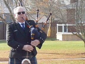 Petrolia St. Andrew's Society past president Tom Rankin plays a tune on the bagpipe to honour the group's 150th anniversary. The Society was formed in 1870 and usually holds a banquet the last Thursday of November. But that's not happening this year because of the pandemic. Carl Hnatyshyn/Postmedia Network
