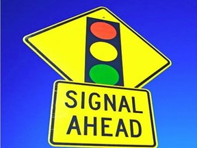 An example of the warning signs going up near the London Road and Brock Street intersection in Sarnia. City council approved intersection improvements Monday after a resident showed video of several motorists running red lights. (City of Sarnia photo)