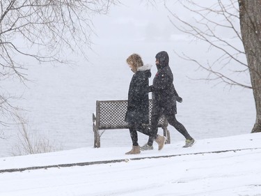 Two women go for a walk during a snowy day in Sudbury, Ont. on Monday November 2, 2020. John Lappa/Sudbury Star/Postmedia Network