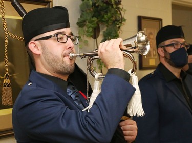 Thomas Flake, of Lockerby Highlanders, plays the bugle at a Remembrance Day service at Branch 564 of the Royal Canadian Legion in Sudbury, Ont. on Wednesday November 11, 2020. John Lappa/Sudbury Star/Postmedia Network