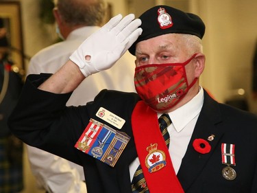 Sergeant-at-arms John McNeil salutes during a Remembrance Day service at Branch 564 of the Royal Canadian Legion in Sudbury, Ont. on Wednesday November 11, 2020. John Lappa/Sudbury Star/Postmedia Network