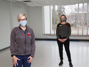 Helen Francis, left, president and CEO of the YMCA of Northeastern Ontario, and Kendra MacIsaac, general manager of health, fitness and aquatics at the YMCA of Northeastern Ontario, stand in an area at the YMCA in Sudbury that has been designated as a warming centre for vulnerable people to access for free, 7 nights a week.