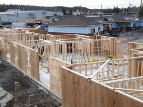 Construction continues on 14 townhouses at Chartwell Meadowbrook Retirement Community in Lively, Ont. on Tuesday November 24, 2020. Meanwhile, 41 units in the newly constructed assisted living area will see a number of people moving into the facility on Dec. 1.