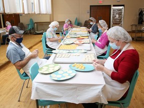 Volunteers prepare pyrohy at St. Mary's Ukrainian Catholic Church in Sudbury, Ont. on Wednesday November 25, 2020. St. Mary's is having a Christmas luncheon on December 3, 2020 from 11 a.m. to 1 p.m. with curbside pick-up only. A meal is $12 and includes four pyrohy, two cabbage rolls, a pork meat stick and borscht soup. A dozen pyrohy, a dozen cabbage rolls, or an order of borscht soup is $9. Organizers are also offering customers the opportunity to gift a meal to a senior by purchasing an extra meal for a senior and that meal will be delivered to a deserving elder in the community. Food must be preordered by Nov. 30. To place an order, call 705-675-8244 or 705-675-1581. Orders over $100 can be delivered within the city.
