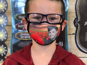 For Remembrance Day, Sydd and Jack, students at École Notre-Dame (Hanmer), proudly wore a mask with a photo of their great-grandfather, Jack Dennis. He served Canada as a leading aviator during the Second World War. Supplied
