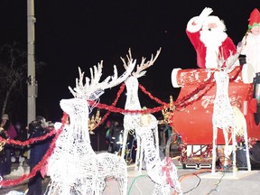 Santa Claus and one of his helpers road into Elliot Lake in fine fashion led by his reindeer in the file photo. Elliot Lake's 41st annual Santa Claus Parade will be entirely static – and with no pedestrian traffic, it will also be COVID-safe.